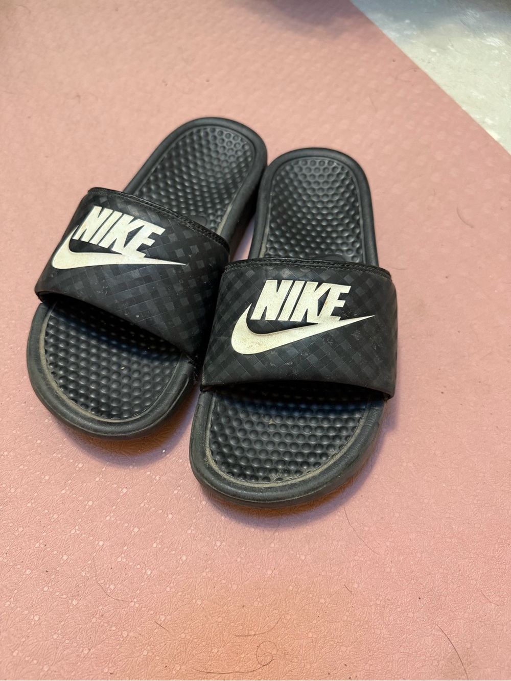 Nike women’s Black Slides with White Logo